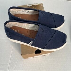 Tom’s canvas slip on shoes